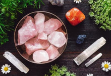 selenite crystal in a bowl with 3 selenite wand in both side